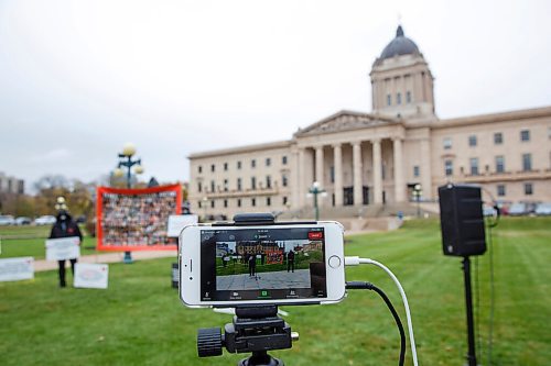 MIKE DEAL / WINNIPEG FREE PRESS
The Justice for PS 752 rally at the Manitoba Legislative building Monday morning which was part of a worldwide rally happening at the same time. 
201005 - Monday, October 05, 2020.