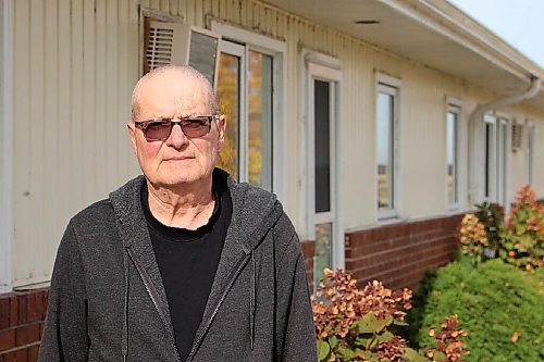 Canstar Community News Jim Moffat stands outside his residence in Sanford on Sept. 29. Moffat and his wife Bev are considering moving to Winnipeg to have ensured hospital admittance, but they'd prefer to stay where they are. (GABRIELLE PICHÉ/CANSTAR COMMUNITY NEWS/HEADLINER)