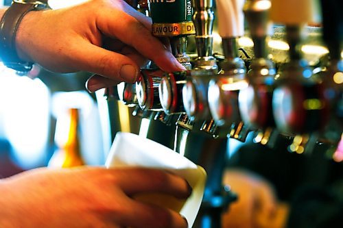 JOHN WOODS / WINNIPEG FREE PRESS
Duncan Ormiston, bartender, serves some drinks at Carlos and Murphy in Winnipeg Monday, October 5, 2020. The provincial authorities announced restaurants must stop selling alcohol by 10pm and close by 11pm.

Reporter: Taniguchi