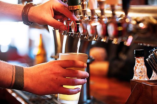 JOHN WOODS / WINNIPEG FREE PRESS
Duncan Ormiston, bartender, serves some drinks at Carlos and Murphy in Winnipeg Monday, October 5, 2020. The provincial authorities announced restaurants must stop selling alcohol by 10pm and close by 11pm.

Reporter: Taniguchi