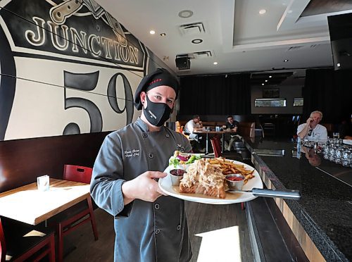 RUTH BONNEVILLE / WINNIPEG FREE PRESS

 LOCAL - hot turkey - Junction 59

Junction 59 Roadhouse Restaurant executive chef, Ryan Glays  with Turkey special lunch platter.  Tuesdays are Turkey Tuesdays @ Junction 59 Roadhouse, open-face turkey sandwich on Texas toast, every Tues, served with all the fixins.

This is for a Sunday Special on restaurants serving turkey year-round, timed for Thanksgiving weekend. Story will run Sunday Oct 11 over two pages 

Dave Sanderson story

Oct 6th, 2020