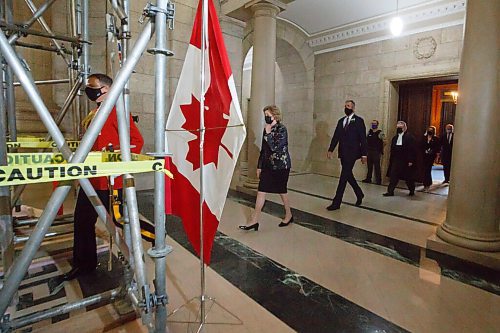 MIKE DEAL / WINNIPEG FREE PRESS
Lieutenant Governor of Manitoba, Janice Filmon, Premier Brian Pallister and other officials pass beneath scaffolding in the rotunda as they head towards the Assembly chambers for the Speech from the throne Wednesday afternoon.
201007 - Wednesday, October 07, 2020.