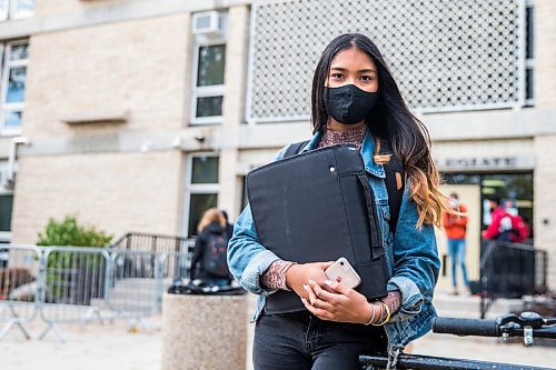 MIKAELA MACKENZIE / WINNIPEG FREE PRESS

Shamailah Islam poses for a portrait in front of Fort Richmond Collegiate in Winnipeg on Thursday, Oct. 8, 2020. For Maggie Macintosh story.

Winnipeg Free Press 2020