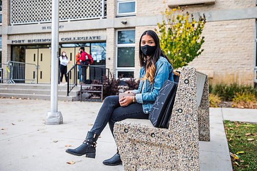 MIKAELA MACKENZIE / WINNIPEG FREE PRESS

Shamailah Islam poses for a portrait in front of Fort Richmond Collegiate in Winnipeg on Thursday, Oct. 8, 2020. For Maggie Macintosh story.

Winnipeg Free Press 2020