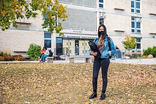 MIKAELA MACKENZIE / WINNIPEG FREE PRESS

Shamailah Islam poses for a portrait in front of Fort Richmond Collegiate in Winnipeg on Thursday, Oct. 8, 2020. For Maggie Macintosh story.

Winnipeg Free Press 2020