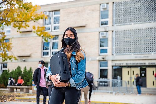 MIKAELA MACKENZIE / WINNIPEG FREE PRESS

Shamailah Islam poses for a portrait in front of Fort Richmond Collegiate in Winnipeg on Thursday, Oct. 8, 2020. For Maggie Macintosh story.

Winnipeg Free Press 2020