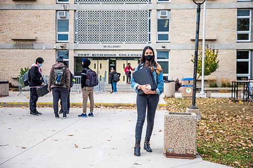 MIKAELA MACKENZIE / WINNIPEG FREE PRESS

Shamailah Islam poses for a portrait in front of Fort Richmond Collegiate in Winnipeg on Thursday, Oct. 8, 2020. For Maggie Macintosh story.

Winnipeg Free Press 2020