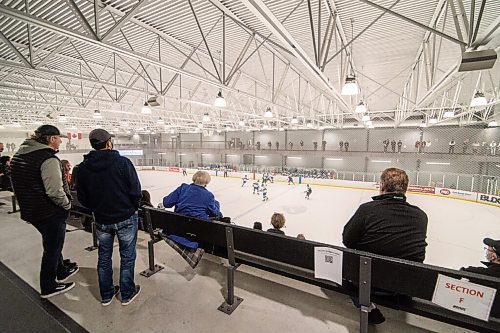 Mike Sudoma / Winnipeg Free Press
The audience keeps their distance as they watch the Winnipeg Freeze take on the Steinbach Pistons during the MJHL Season opener Friday night at RINK Training Centre
October 9, 2020