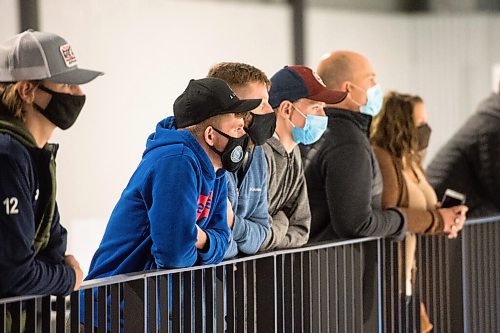 Mike Sudoma / Winnipeg Free Press
The audience keeps their distance as they watch the Winnipeg Freeze take on the Steinbach Pistons during the MJHL Season opener Friday night at RINK Training Centre
October 9, 2020