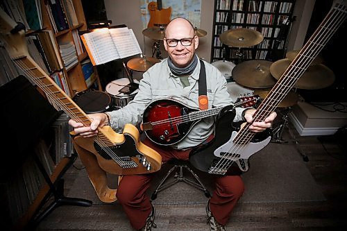 JOHN WOODS / WINNIPEG FREE PRESS
Robert Burton, owner of River Heights School of Music, is photographed with a few of his new musical toys in his studio Monday, October 12, 2020. Guitar lessons and purchases have increased during the COVID-19 pandemic.

Reporter: Small