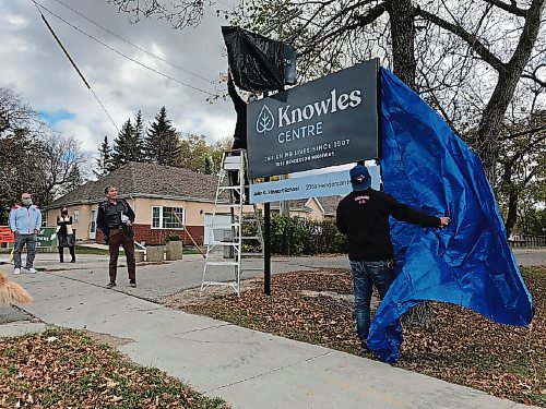Canstar Community News Knowles Centre CEO Michael Burdz looks on as a new sign, featuring Knowles Centres new logo and branding, was unveiled on Oct. 7 at 2065 Henderson Hwy. (SHELDON BIRNIE/CANSTAR/THE HERALD)