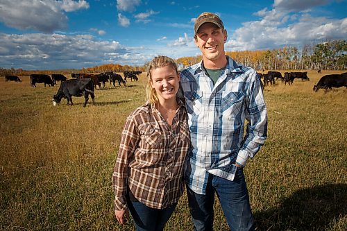 MIKE DEAL / WINNIPEG FREE PRESS
All in a day's work, Kristine and Graham Tapley replace a fence and move a herd of cattle to fresh grazing as well as keep up to date on the chemical analysis of their feed.
See Eva Wasney feature
200929 - Tuesday, September 29, 2020.