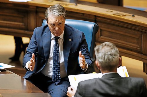 JOHN WOODS / WINNIPEG FREE PRESS
Manitoba Minister of Health Cameron Friesen and Premier Brian Pallister talk during question period at the Manitoba Legislature Wednesday, October 14, 2020. 

Reporter: Sanders