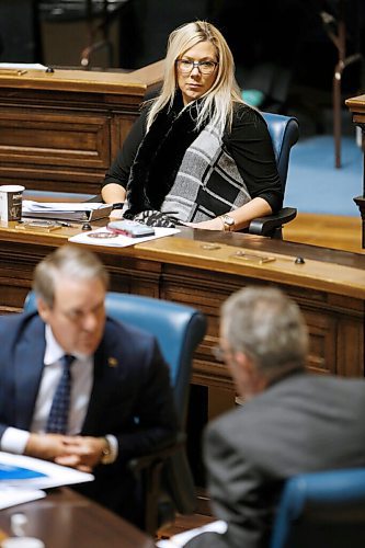 JOHN WOODS / WINNIPEG FREE PRESS
Manitoba Minister of Municipal Affairs Rochelle Squires looks on as Cameron Friesen and Brian Pallister talk during question period at the Manitoba Legislature Wednesday, October 14, 2020. 

Reporter: Sanders