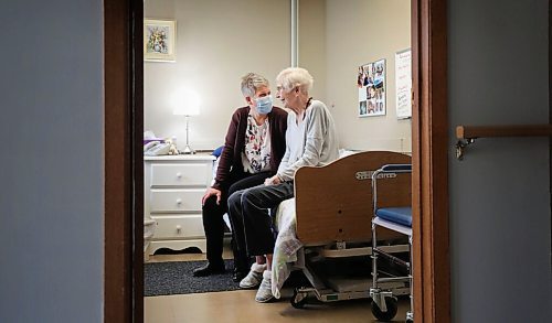 RUTH BONNEVILLE / WINNIPEG FREE PRESS

49.8 column - Jocelyn House, 

Who: Jacqueline Bouvier, spiritual care and volunteer manager, and resident Sheila Bradley, conversing together like old friends in Bradley's room at Jocelyn House on Thursday. 

What: For Melissa's 49.8 column, she's checking in at Jocelyn House hospice, which marks its 35th anniversary next week. It was supposed to be a week of celebrations and commemorations of what this place has meant to the over 400 families that have had residents end their lives there, but with COVID-19 all of that is on hold. Piece is reflecting on how the pandemic has changed life for those already at the end of theirs.

Oct 15th, 2020