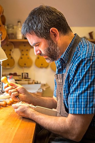 MIKAELA MACKENZIE / WINNIPEG FREE PRESS

Garth Lee works on carving a scroll in his studio, where he builds violins, violas, and cellos from scratch, in Winnipeg on Friday, Oct. 16, 2020. For Holly Harris story.

Winnipeg Free Press 2020