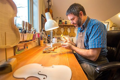 MIKAELA MACKENZIE / WINNIPEG FREE PRESS

Garth Lee works on carving a scroll in his studio, where he builds violins, violas, and cellos from scratch, in Winnipeg on Friday, Oct. 16, 2020. For Holly Harris story.

Winnipeg Free Press 2020