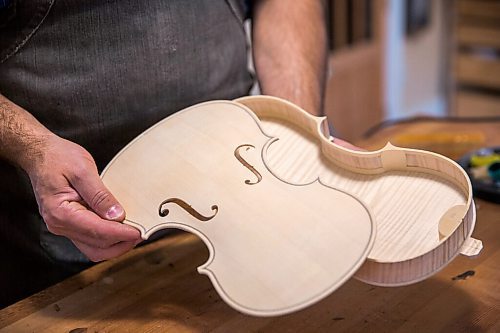 MIKAELA MACKENZIE / WINNIPEG FREE PRESS

Garth Lee shows an unfinished violin in his studio, where he builds violins, violas, and cellos from scratch, in Winnipeg on Friday, Oct. 16, 2020. For Holly Harris story.

Winnipeg Free Press 2020