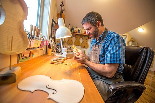 MIKAELA MACKENZIE / WINNIPEG FREE PRESS

Garth Lee works on carving a scroll in his studio, where he builds violins, violas, and cellos from scratch, in Winnipeg on Friday, Oct. 16, 2020. For Holly Harris story.

Winnipeg Free Press 2020