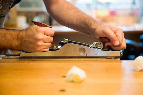 MIKAELA MACKENZIE / WINNIPEG FREE PRESS

Garth Lee planes a brace in his studio, where he builds violins, violas, and cellos from scratch, in Winnipeg on Friday, Oct. 16, 2020. For Holly Harris story.

Winnipeg Free Press 2020