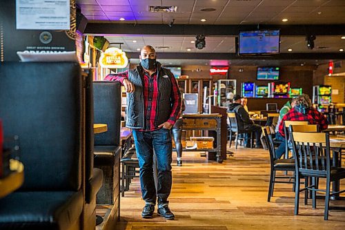 MIKAELA MACKENZIE / WINNIPEG FREE PRESS

Ravi Ramberran, owner of the Four Crowns, poses for a portrait in the bar and restaurant in Winnipeg on Friday, Oct. 16, 2020. Bars, beverage rooms, nightclubs, and bingo halls have been ordered to close for two weeks starting Monday. For Malak Abas story.

Winnipeg Free Press 2020