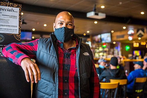 MIKAELA MACKENZIE / WINNIPEG FREE PRESS
Ravi Ramberran, owner of the Four Crowns, poses for a portrait in the bar and restaurant in Winnipeg on Friday, Oct. 16, 2020. Bars, beverage rooms, nightclubs, and bingo halls have been ordered to close for two weeks starting Monday. For Malak Abas story.
Winnipeg Free Press 2020
