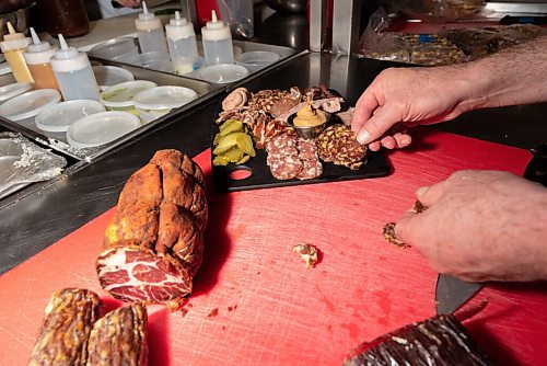 JESSE BOILY  / WINNIPEG FREE PRESS
Tristan Foucault, chef and owner, prepares a tray of the house made cured meats at Preservation Hall on Friday. Friday, Oct. 16, 2020.
Reporter: