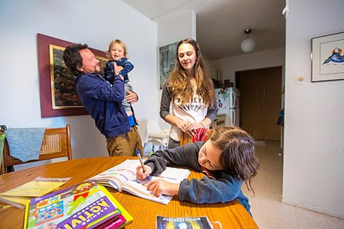 MIKAELA MACKENZIE / WINNIPEG FREE PRESS

Winter Wright and her family (David Wright, Riel Wright, and Rose Flater), work on school work in their home in Winnipeg on Monday, Oct. 19, 2020. The Manitoba Metis Federation has built its own online learning portal and is now providing families with homeschool support teachers. For Maggie Macintosh story.

Winnipeg Free Press 2020