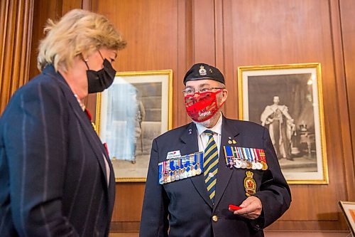 MIKAELA MACKENZIE / WINNIPEG FREE PRESS

Lt.-Gov. Janice Filmon and comrade Ronn Anderson, chairman of the poppy campaign, pose for a photo after presenting the first poppy of the poppy campaign at the Manitoba Legislative Building in Winnipeg on Wednesday, Oct. 21, 2020. Standup.

Winnipeg Free Press 2020