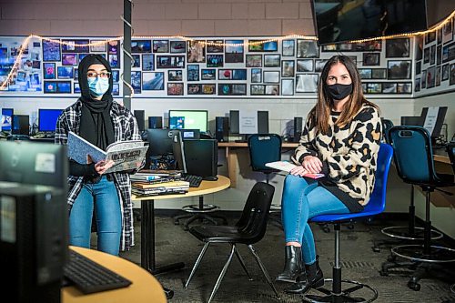 MIKAELA MACKENZIE / WINNIPEG FREE PRESS

Yearbook teacher Heather Bell (right) and student Ayesha Qadir pose for a portrait at Fort Richmond Collegiate in Winnipeg on Thursday, Oct. 22, 2020. Putting yearbooks together in a pandemic is proving to be a challenge. For Maggie Macintosh story.

Winnipeg Free Press 2020