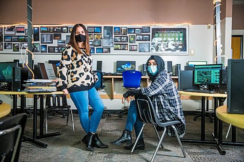 MIKAELA MACKENZIE / WINNIPEG FREE PRESS

Yearbook teacher Heather Bell (left) and student Ayesha Qadir pose for a portrait at Fort Richmond Collegiate in Winnipeg on Thursday, Oct. 22, 2020. Putting yearbooks together in a pandemic is proving to be a challenge. For Maggie Macintosh story.

Winnipeg Free Press 2020