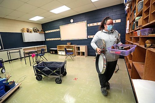 RUTH BONNEVILLE / WINNIPEG FREE PRESS

Forest Park School music teacher, Erin Risbey, packs up  musical instruments and supplies from the schools music room being converted into a classroom Friday.  

See Maggie Macintosh's story,
Education Reporter - Winnipeg Free Press

Oct 23rd, 2020