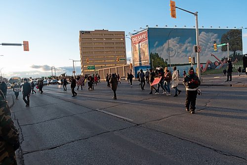 JESSE BOILY  / WINNIPEG FREE PRESS
Demonstrators marched down Portage Ave and blocked both lanes of traffic at St. James st. on Friday evening. Demonstrators held signs in support of the Wetsuweten and Mikmaki. Friday, Oct. 23, 2020.
Reporter:STDUP