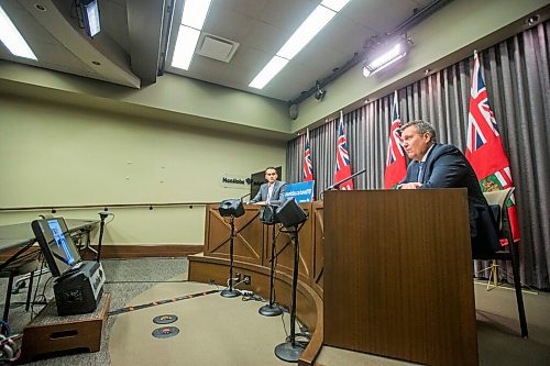 MIKAELA MACKENZIE / WINNIPEG FREE PRESS

Justice minister Cliff Cullen (right) and Dr. Jazz Atwal speak at a press conference at the Manitoba Legislative Building in Winnipeg on Monday, Oct. 26, 2020. For Carol Sanders story.

Winnipeg Free Press 2020