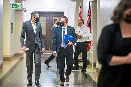 MIKAELA MACKENZIE / WINNIPEG FREE PRESS

Justice minister Cliff Cullen (right) and Dr. Jazz Atwal walk in to speak at a press conference at the Manitoba Legislative Building in Winnipeg on Monday, Oct. 26, 2020. For Carol Sanders story.

Winnipeg Free Press 2020