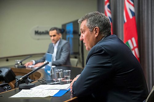 MIKAELA MACKENZIE / WINNIPEG FREE PRESS

Justice minister Cliff Cullen (right) and Dr. Jazz Atwal speak at a press conference at the Manitoba Legislative Building in Winnipeg on Monday, Oct. 26, 2020. For Carol Sanders story.

Winnipeg Free Press 2020