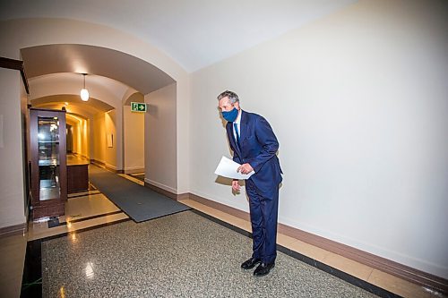 MIKAELA MACKENZIE / WINNIPEG FREE PRESS

Premier Brian Pallister takes a little bow (??) before walking in to speak to the media about legislative amendments for COVID-19 job-protected leave at the Manitoba Legislative Building in Winnipeg on Monday, Oct. 26, 2020. For Carol/Larry story.

Winnipeg Free Press 2020