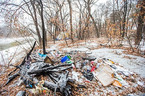 MIKAELA MACKENZIE / WINNIPEG FREE PRESS

The site of a fire at a homeless encampment along the river near the Granite Curling Club in Winnipeg on Tuesday, Oct. 27, 2020. For --- story.

Winnipeg Free Press 2020