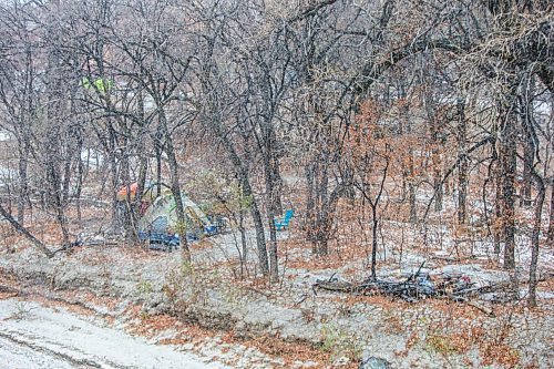 MIKAELA MACKENZIE / WINNIPEG FREE PRESS

The site of a fire at a homeless encampment along the river near the Granite Curling Club in Winnipeg on Tuesday, Oct. 27, 2020. For --- story.

Winnipeg Free Press 2020