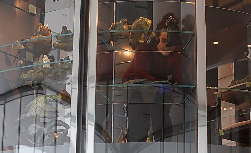 MIKE DEAL / WINNIPEG FREE PRESS
Nicole Fletcher, collections coordinator installing art work in the vault which will open late February 2021, during an announcement Wednesday morning, that a circle of language keepers has given an Inuktitut name to what was formerly known as the Inuit Art Centre: Qaumajuq [HOW-ma-yourq], meaning It is bright, it is lit.
201028 - Wednesday, October 28, 2020.