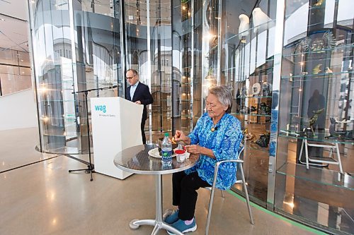 MIKE DEAL / WINNIPEG FREE PRESS
Elder Martha Peet lights a qulliq, a traditional Inuit lamp, during an announcement Wednesday morning with Dr. Stephen Borys, Director & CEO, Winnipeg Art Gallery, that a circle of language keepers has given an Inuktitut name to what was formerly known as the Inuit Art Centre: Qaumajuq [HOW-ma-yourq], meaning It is bright, it is lit.
201028 - Wednesday, October 28, 2020.