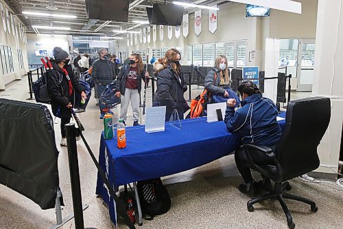 JOHN WOODS / WINNIPEG FREE PRESS
People are checked-in before a game between the Winnipeg Thrashers and Winnipeg Wild play at the Iceplex in Wednesday, October 28, 2020. 

Reporter: McIntyre