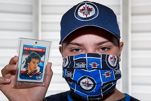 MIKE DEAL / WINNIPEG FREE PRESS
Holding up a signed Hawerchuk card, Fifteen-year-old Grayson Hubel, who loves collecting hockey cards, was not surprised to hear that the industry has been doing so well during the pandemic. (He has over 3,000). Going to get new cards feels like Christmas, says the River East Collegiate Grade 10 student. When I think about cards, Im not thinking about my math test. Im only thinking about cards.
See Ben Waldman story
201029 - Thursday, October 29, 2020.