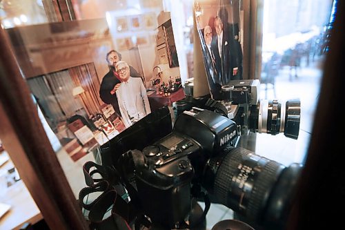 JOHN WOODS / WINNIPEG FREE PRESS
Cabinet with old restaurant and celebrity photos at Alfonso Maurys pizzeria Corrientes photographed Thursday, October 29, 2020. Photos include his father Hector with Pavorratti and Tony Bennett beside his fathers cameras.

Reporter: Sanders