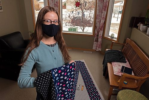 JESSE BOILY  / WINNIPEG FREE PRESS
Estella Roberts, 16, the grade 11 student, works on one of the scarfs she is making for the Main Street Project at her home on Friday. Friday, Oct. 30, 2020.
Reporter: