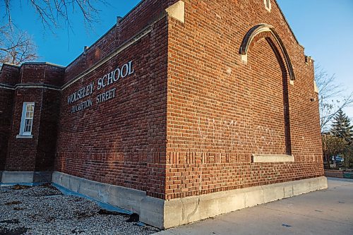 MIKE DEAL / WINNIPEG FREE PRESS
As Winnipeg heads into a code red according to the on the province's pandemic response system graffiti has been painted onto the side of Wolseley School Monday morning saying, "Unmask Gods Children."
201102 - Monday, November 02, 2020.