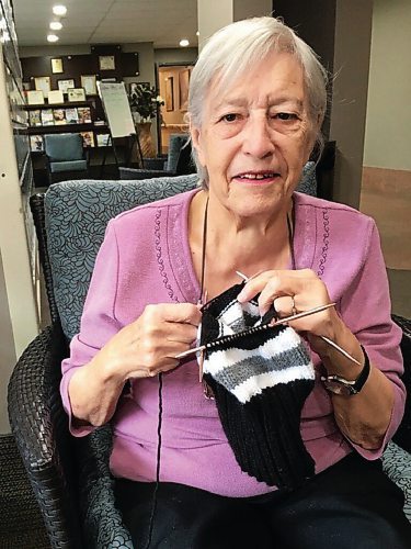 Canstar Community News Pat Dodd, of Riverside Lions Estate in St. Vital, has been making knitted items such as mittens, socks and toques for years.