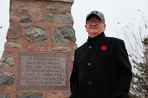 Canstar Community News Roy Switzer, the president of Royal Canadian Legion Branch #171 in Sanford, stands beside the town's war memorial on Oct. 27. Switzer will be one of the few attending the community's Remembrance Day service this year. (GABRIELLE PICHE/CANSTAR COMMUNITY NEWS/HEADLINER)