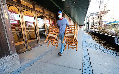 RUTH BONNEVILLE / WINNIPEG FREE PRESS

local - Bay downtown Clearance sale 

David Fache makes his way down Vaughan street with 4 chairs from the nostalgic Paddlewheel restaurant that once was a icon on the 6th floor of downtown Bay store, Wednesday.  He plans on bringing them out to his families cottage. 


BAY BRITE: The Bay downtown is selling off its assets, including memorabilia such as old chairs from the Paddlewheel. The Bay location is closing its doors early next year.  Story of shoppers by Kellen.


Nov 4th,,  2020