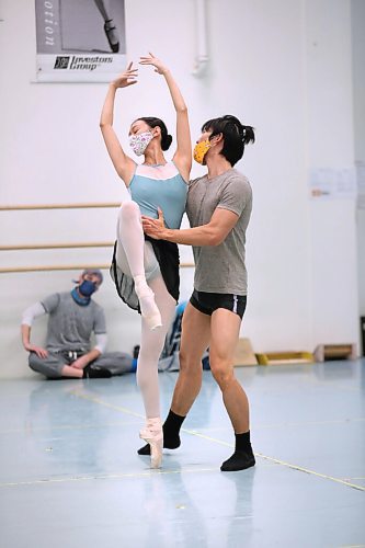 RUTH BONNEVILLE / WINNIPEG FREE PRESS

ENT - RWB

Photo of RWB cohort dancers, Yue She (male) and Chenxin Liu, dancing together during rehearsal.  

Royal Winnipeg Ballet  company dancers are navigating a new normal, documentary photos of one of their rehearsals in the world of COVID-19.

See Jen Zoratti's story.

Nov 5th,  2020